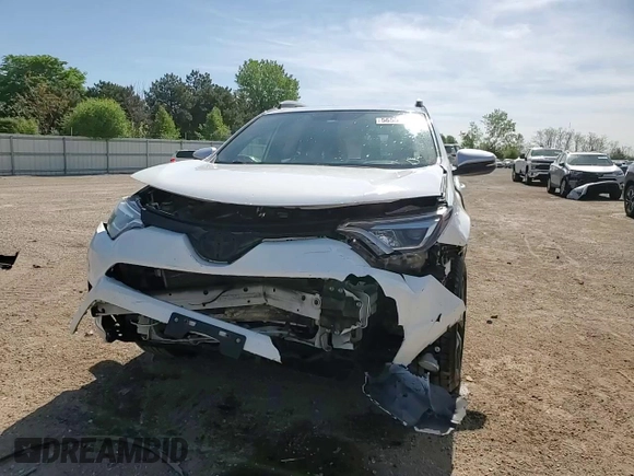 2016 Toyota RAV4 SE with VIN JTMJFREV3GJ054196, listed as a Copart auction lot 56556805 with 130,104 mi miles and Salvage title. Bid and sale history available at DreamBid. Image 13.