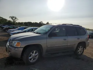 2002 GMC Envoy SLT with VIN 1GKDT13S322420861, listed as a Copart auction lot 63408164 with 250,167 mi miles and Salvage Title. Bid and sale history available at carsss.com. Image 1.