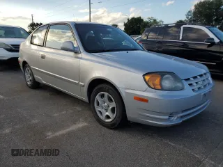 2004 Hyundai Accent GL with VIN KMHCG35C74U312579, listed as a Copart auction lot 75397884 with 0 mi miles and Salvage Title. Bid and sale history available at carsss.com. Image 4.
