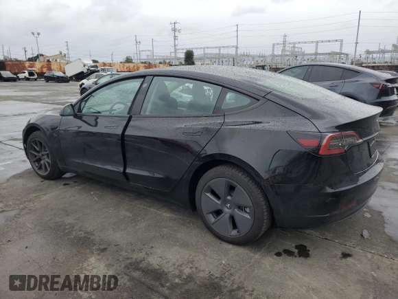 2023 Tesla Model 3 with VIN 5YJ3E1EA1PF677592, listed as a Copart auction lot 47621875 with 12,247 mi miles and Salvage Title. Bid and sale history available at DreamBid. Image 2.