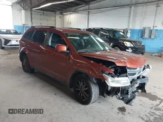 2014 Dodge Journey SXT z VIN 3C4PDDBG7ET173514, wystawiony jako IAAI lot #42305881 z przebiegiem 208 577 mil mil oraz . Historia ofert i sprzedaży dostępna na DreamBid. Obrazek 1.