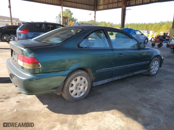 1999 Honda Civic DX with VIN 1HGEJ6224XL039608, listed as a Copart auction lot 77788394 with 292,199 mi miles and Clean Title. Bid and sale history available at carsss.com. Image 3.