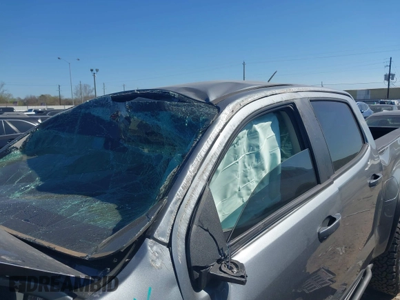 2018 Chevrolet Colorado 4WD ZR2 z VIN 1GCGTEEN0J1115894, wystawiony jako IAAI lot #41774860 z przebiegiem 71 698 mil mil oraz . Historia ofert i sprzedaży dostępna na DreamBid. Obrazek 6.