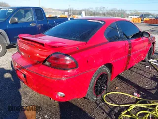 2000 Pontiac Grand Am GT with VIN 1G2NW12E2YM806353, listed as a IAAI auction lot 41803280 with 195,247 mi miles. Bid and sale history available at carsss.com. Image 4.