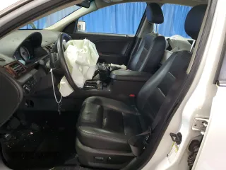 2008 Ford Taurus Limited with VIN 1FAHP25W68G137797, listed as a Copart auction lot 51628665 with 141,125 mi miles and Salvage Title. Bid and sale history available at DreamBid. Image 7.