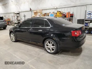 2006 Volkswagen Jetta 1.9L TDI z VIN 3VWST71KX6M711152, wystawiony jako Copart lot #57435505 z przebiegiem 209 511 mil mil oraz Nie do naprawy • Non repairable. Historia ofert i sprzedaży dostępna na DreamBid. Obrazek 2.
