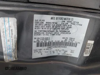 2005 Ford Focus S with VIN 1FAFP34N65W246882, listed as a IAAI auction lot 41894030 with 289,678 mi miles. Bid and sale history available at carsss.com. Image 9.