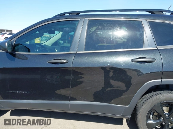2016 Jeep Cherokee Altitude with VIN 1C4PJLAB2GW329397, listed as a IAAI auction lot 42294033 with 96,812 mi miles and . Bid and sale history available at DreamBid. Image 15.