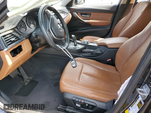 2015 BMW 3 Series 328i xDrive with VIN WBA3B5G50FNS16915, listed as a Copart auction lot 61603915 with 137,059 mi miles and Salvage title. Bid and sale history available at DreamBid. Image 7.