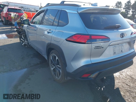 2023 Toyota Corolla Cross Hybrid S with VIN 7MUFBABG7PV003141, listed as a IAAI auction lot 41443111 with 16,297 mi miles and . Bid and sale history available at DreamBid. Image 3.