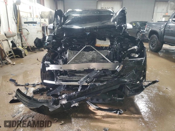 2023 BMW X1 xDrive28i with VIN WBX73EF08P5X85250, listed as a Copart auction lot 50158565 with 7,312 mi miles and Salvage Title. Bid and sale history available at DreamBid. Image 5.