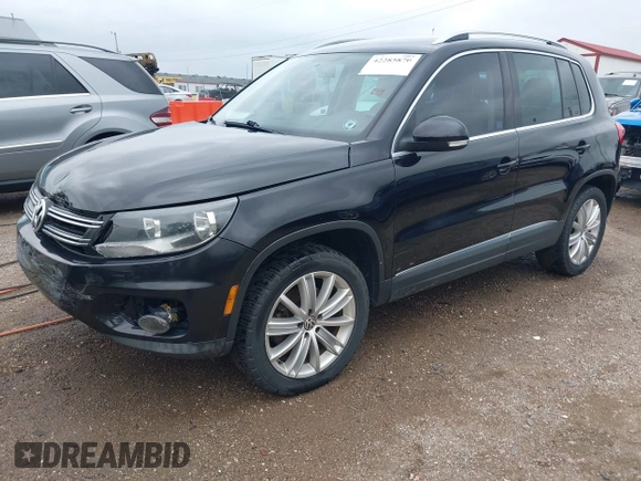2012 Volkswagen Tiguan SE z VIN WVGBV7AX0CW558863, wystawiony jako IAAI lot #42285870 z przebiegiem 158 521 mil mil oraz . Historia ofert i sprzedaży dostępna na DreamBid. Obrazek 17.