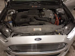 2015 Ford Fusion SE Hybrid with VIN 3FA6P0LU7FR266702, listed as a IAAI auction lot 41390791 with 94,465 mi miles. Bid and sale history available at carsss.com. Image 10.