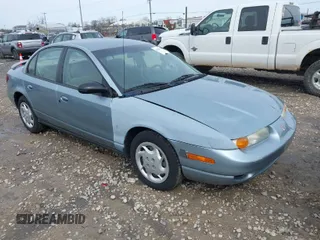 2002 Saturn SL with VIN 1G8ZK52702Z105381, listed as a IAAI auction lot 41962378 with 169,204 mi miles. Bid and sale history available at carsss.com. Image 1.