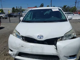 2011 Toyota Sienna LE AAS with VIN 5TDKK3DC3BS164612, listed as a IAAI auction lot 42302123 with 165,941 mi miles and . Bid and sale history available at DreamBid. Image 12.