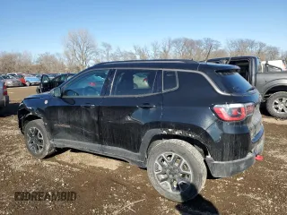 2019 Jeep Compass Trailhawk with VIN 3C4NJDDB1KT727756, listed as a Copart auction lot 42439055 with 104,525 mi miles and Salvage Title. Bid and sale history available at carsss.com. Image 2.