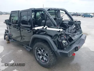 2021 Jeep Wrangler Unlimited Rubicon with VIN 1C4HJXFG7MW662092, listed as a IAAI auction lot 42139521 with 32,055 mi miles and . Bid and sale history available at carsss.com. Image 3.
