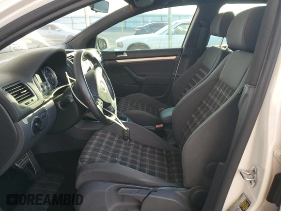 2008 Volkswagen GTI z VIN WVWHD71K18W290337, wystawiony jako Copart lot #75297034 z przebiegiem 117 224 mil mil oraz Szkoda całkowita • Salvage title. Historia ofert i sprzedaży dostępna na DreamBid. Obrazek 7.