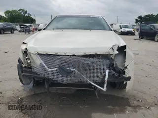 2009 Cadillac CTS RWD z VIN 1G6DU57V690113794, wystawiony jako Copart lot #55104185 z przebiegiem 157 599 mil mil oraz Szkoda całkowita • Salvage title. Historia ofert i sprzedaży dostępna na DreamBid. Obrazek 5.