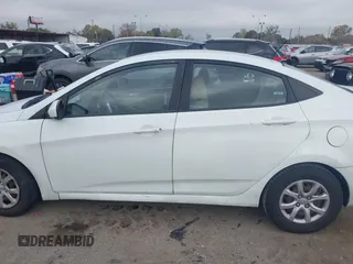 2013 Hyundai Accent GLS with VIN KMHCT4AE3DU325550, listed as a IAAI auction lot 41185651 with 128,791 mi miles and . Bid and sale history available at DreamBid. Image 14.