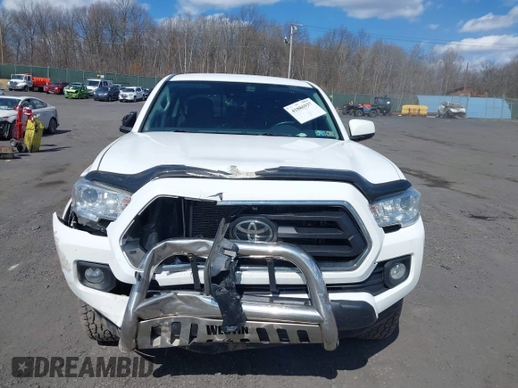 2020 Toyota Tacoma SR5 with VIN 3TMCZ5AN5LM339977, listed as a IAAI auction lot 41886937 with 94,986 mi miles and . Bid and sale history available at DreamBid. Image 12.