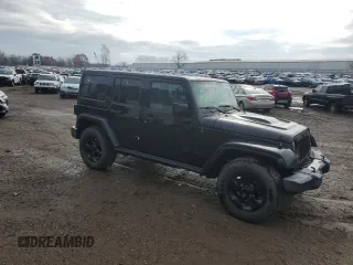 2015 Jeep Wrangler Unlimited Altitude with VIN 1C4HJWEG1FL703736, listed as a Copart auction lot 78448254 with 148,264 mi miles and Clean title. Bid and sale history available at DreamBid. Image 4.