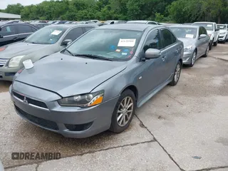 2016 Mitsubishi Lancer ES with VIN JA32U2FU4GU008977, listed as a IAAI auction lot 42139304 with 145,521 mi miles. Bid and sale history available at carsss.com. Image 2.
