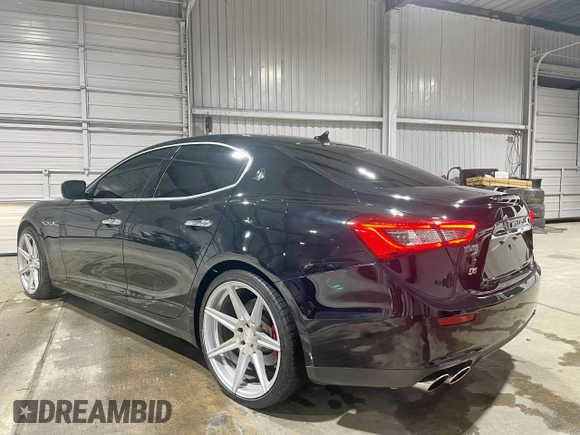 2014 Maserati Ghibli S Q4 z VIN ZAM57RTA9E1112724, wystawiony jako Copart lot #57189295 z przebiegiem 45 525 mil mil oraz Szkody całkowita. Historia ofert i sprzedaży dostępna na DreamBid. Obrazek 3.