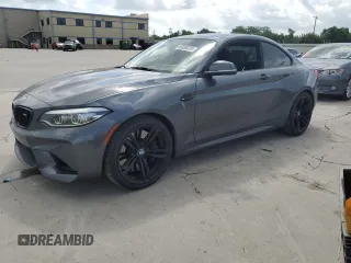 2018 BMW M2 z VIN WBS1J5C50JVD37726, wystawiony jako Copart lot #59069224 z przebiegiem 76 260 mil mil oraz Czysty tytuł • Clean title. Historia ofert i sprzedaży dostępna na DreamBid. Obrazek 1.
