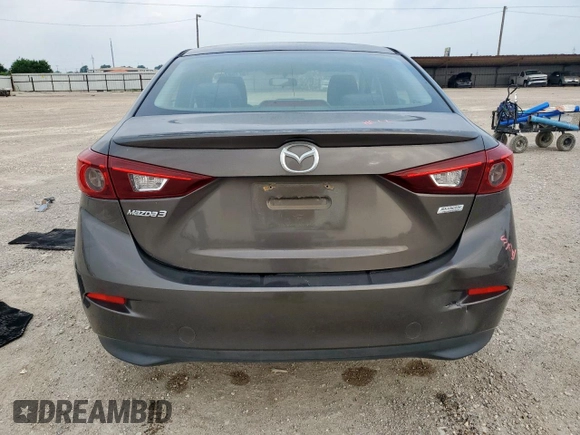 2014 Mazda 3 i Touring z VIN 3MZBM1V76EM112344, wystawiony jako Copart lot #57168785 z przebiegiem 122 826 mil mil oraz Szkoda całkowita • Salvage title. Historia ofert i sprzedaży dostępna na DreamBid. Obrazek 6.