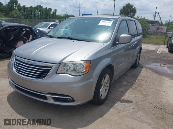 2016 Chrysler Town & Country Touring with VIN 2C4RC1BG4GR193462, listed as a IAAI auction lot 42200990 with 140,430 mi miles. Bid and sale history available at carsss.com. Image 17.