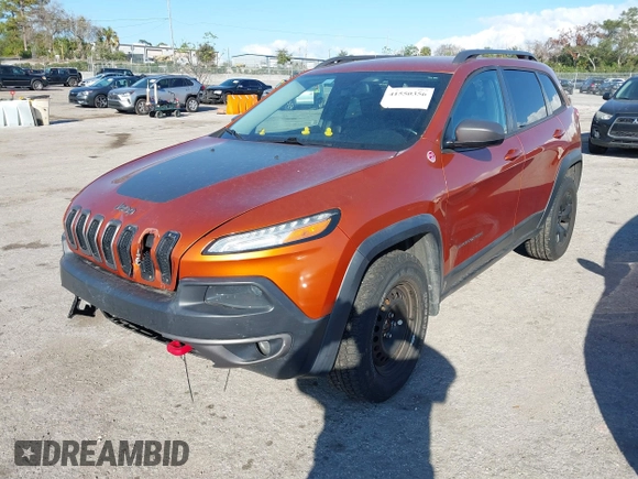 2014 Jeep Cherokee Trailhawk with VIN 1C4PJMBS4EW254879, listed as a IAAI auction lot 41550356 with 101,077 mi miles. Bid and sale history available at carsss.com. Image 22.