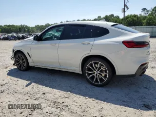 2019 BMW X4 M40i z VIN 5UXUJ5C57KLJ63215, wystawiony jako Copart lot #55150835 z przebiegiem Nie podano mil oraz Szkody całkowita. Historia ofert i sprzedaży dostępna na DreamBid. Obrazek 2.