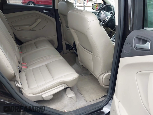 2013 Ford Escape SEL z VIN 1FMCU9H98DUB78564, wystawiony jako IAAI lot #42381290 z przebiegiem 89 728 mil mil oraz . Historia ofert i sprzedaży dostępna na DreamBid. Obrazek 8.