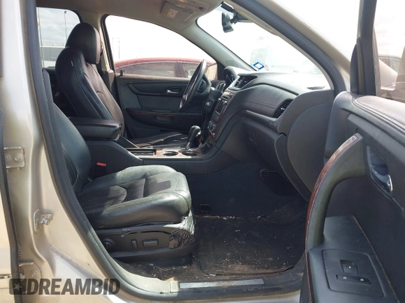 2014 Chevrolet Traverse LTZ z VIN 1GNKRJKDXEJ248849, wystawiony jako IAAI lot #41805119 z przebiegiem 171 489 mil mil oraz . Historia ofert i sprzedaży dostępna na DreamBid. Obrazek 5.
