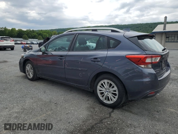 2017 Subaru Impreza Premium with VIN 4S3GTAD61H3711128, listed as a Copart auction lot 58942425 with 127,890 mi miles and Salvage title. Bid and sale history available at DreamBid. Image 2.