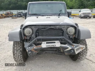 2016 Jeep Wrangler Unlimited Sahara with VIN 1C4BJWEGXGL264740, listed as a Copart auction lot 57225115 with 183,647 mi miles and Salvage title. Bid and sale history available at DreamBid. Image 5.