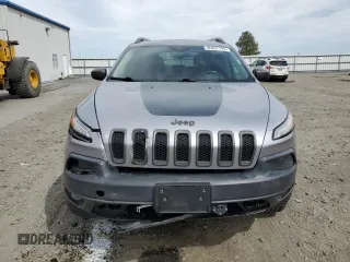 2014 Jeep Cherokee Trailhawk with VIN 1C4PJMBS6EW159174, listed as a Copart auction lot 56097795 with 130,299 mi miles and Salvage title. Bid and sale history available at DreamBid. Image 5.