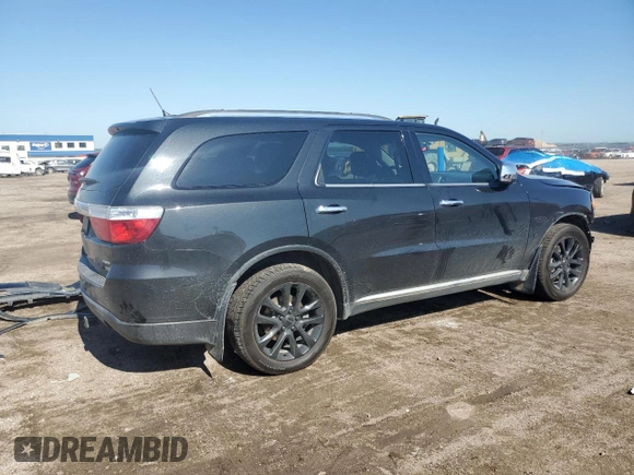 2013 Dodge Durango Crew with VIN 1C4RDJDG5DC701016, listed as a Copart auction lot 60832385 with 236,719 mi miles and Salvage title. Bid and sale history available at DreamBid. Image 3.