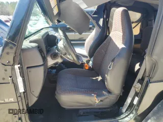 2001 Jeep Wrangler Sport with VIN 1J4FA49S51P337995, listed as a Copart auction lot 47461975 with 160,305 mi miles and Salvage Title. Bid and sale history available at carsss.com. Image 7.