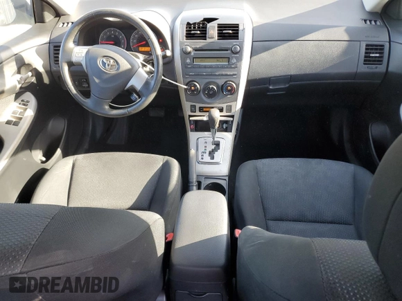 2010 Toyota Corolla z VIN 1NXBU4EE2AZ281538, wystawiony jako Copart lot #54864765 z przebiegiem 157 326 mil mil oraz Szkoda całkowita • Salvage title. Historia ofert i sprzedaży dostępna na DreamBid. Obrazek 8.
