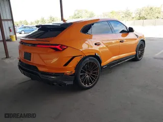 2023 Lamborghini Urus Performante with VIN ZPBUC3ZL6PLA25073, listed as a IAAI auction lot 41450564 with 13,945 mi miles. Bid and sale history available at carsss.com. Image 4.