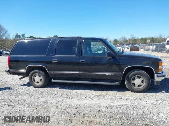 1999 Chevrolet Suburban with VIN 3GNEC16R0XG137834, listed as a IAAI auction lot 41853492 with 296,147 mi miles and . Bid and sale history available at DreamBid. Image 13.