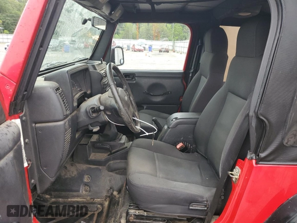 2006 Jeep Wrangler X с VIN 1J4FA39S06P766687, выставлен на аукционе Copart как лот 55791365 с пробегом 220 712 миль миль и Списание • Salvage title. История ставок и продаж доступна на DreamBid. Изображение 7.