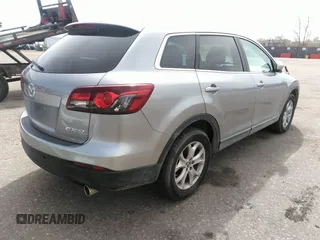 2014 Mazda CX-9 Touring z VIN JM3TB2CV5E0437629, wystawiony jako IAAI lot #41849662 z przebiegiem 105 311 mil mil oraz . Historia ofert i sprzedaży dostępna na DreamBid. Obrazek 4.