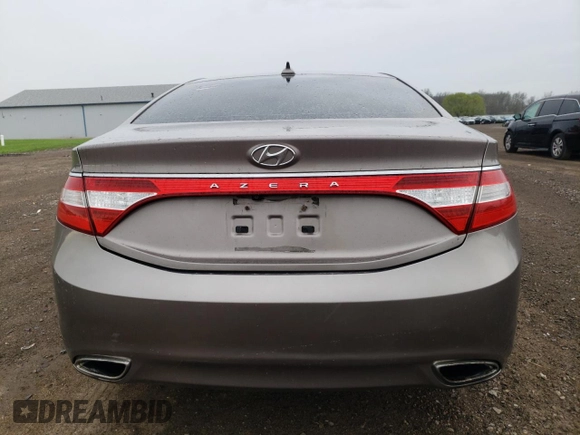 2013 Hyundai Azera z VIN KMHFG4JG7DA216478, wystawiony jako Copart lot #53998885 z przebiegiem 154 277 mil mil oraz Czysty tytuł • Clean title. Historia ofert i sprzedaży dostępna na DreamBid. Obrazek 6.