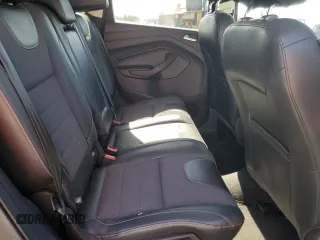 2016 Ford Escape SE z VIN 1FMCU9G96GUB76771, wystawiony jako Copart lot #59188375 z przebiegiem 167 300 mil mil oraz Szkoda całkowita • Salvage title. Historia ofert i sprzedaży dostępna na DreamBid. Obrazek 11.