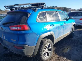 2017 Jeep Cherokee Trailhawk with VIN 1C4PJMBS4HW602362, listed as a IAAI auction lot 41337004 with 139,926 mi miles and . Bid and sale history available at DreamBid. Image 4.