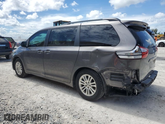 2015 Toyota Sienna XLE with VIN 5TDYK3DCXFS668851, listed as a Copart auction lot 60452005 with 205,549 mi miles and Salvage title. Bid and sale history available at DreamBid. Image 2.