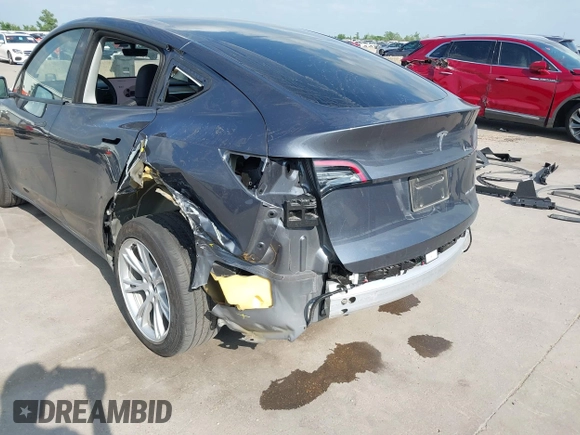 2023 Tesla Model Y Long Range with VIN 7SAYGDEEXPA078629, listed as a IAAI auction lot 42046354 with 27,245 mi miles and . Bid and sale history available at DreamBid. Image 6.
